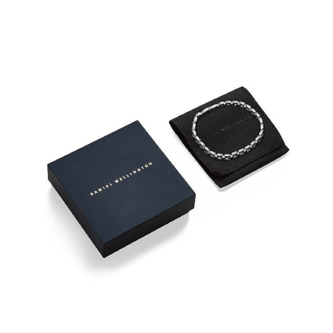 Daniel Wellington 3-Link silver stainless steel bracelet with a fold-over clasp, presented in a branded gift box and pouch.