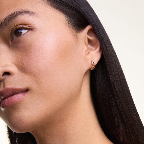 Elegant 13.6mm rose gold 3-link hoop earrings crafted from stainless steel for a sophisticated, minimalist look.