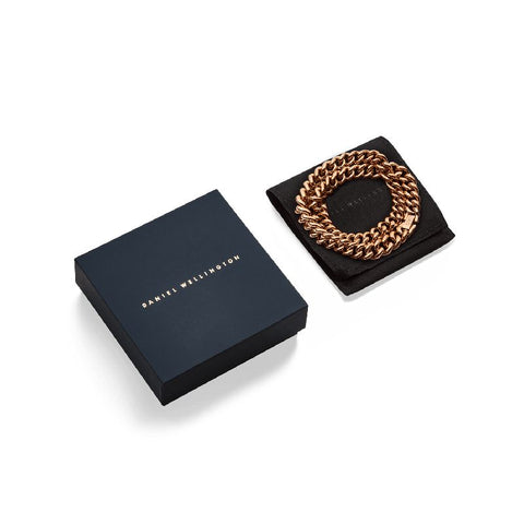 Daniel Wellington rose gold chunky chain necklace in a branded gift box and black velvet pouch.