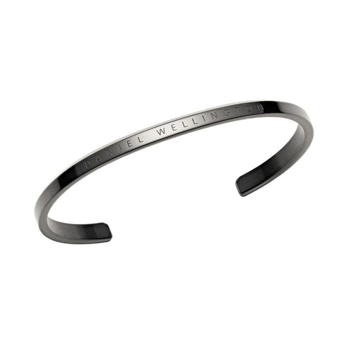 Minimalist Daniel Wellington Classic Bracelet in graphite stainless steel with engraved logo detail.