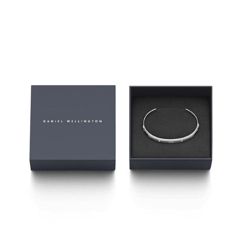 Silver Daniel Wellington Classic Lumine cuff bangle with six sparkling crystals in a branded gift box.