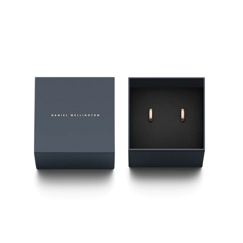 Rose gold Classic Lumine hoop earrings with crystals in a branded Daniel Wellington gift box.