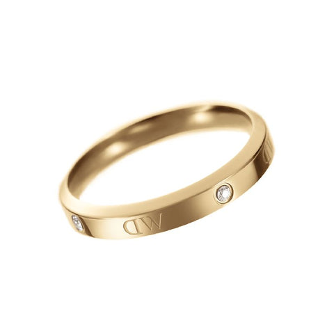 Gold Daniel Wellington Classic Lumine ring featuring sparkling crystals and engraved logotype on stainless steel.