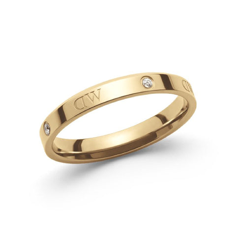 Gold-plated stainless steel Daniel Wellington Classic Lumine ring featuring sparkling crystals and logo etchings.