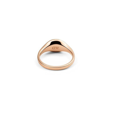 Minimalist Daniel Wellington Classic Mini Signet Ring in polished rose gold-plated stainless steel with DW logo.