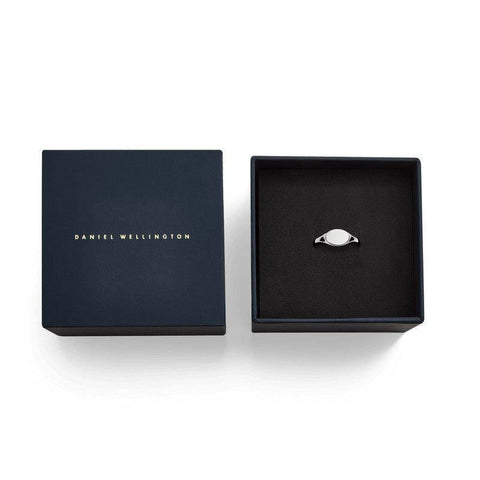 Minimalist Daniel Wellington Classic Mini Signet Ring in polished silver stainless steel, presented in a branded gift box.