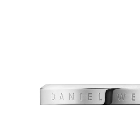 Elegant Daniel Wellington Classic Ring in polished silver stainless steel with engraved logo branding.