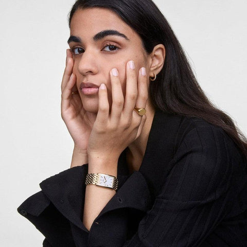 Elegant gold-plated stainless steel Classic Signet Ring worn on a finger, featuring a polished flat surface design.