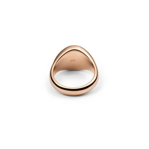 Minimalist Daniel Wellington Classic Signet Ring in polished rose gold stainless steel with engraved DW logo.