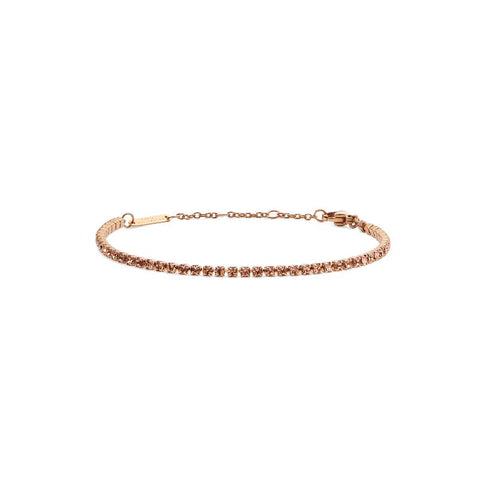 Daniel Wellington Classic Tennis Bracelet in radiant rose gold with shimmering apricot crystals and adjustable chain.