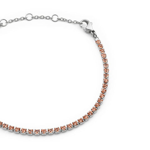 Daniel Wellington Classic Tennis Bracelet in silver stainless steel with radiant apricot crystals and adjustable lobster clasp.
