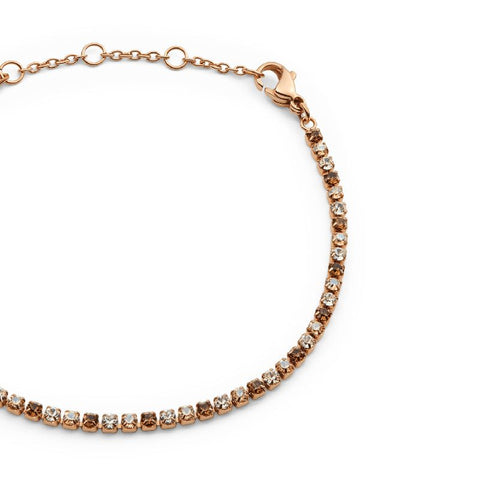 Rose gold Daniel Wellington tennis bracelet featuring shimmering honey crystals and an adjustable lobster clasp.