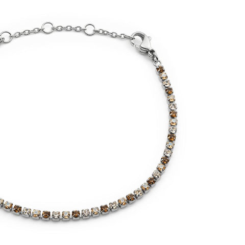 Daniel Wellington silver tennis bracelet featuring shimmering honey crystals and an adjustable stainless steel chain.