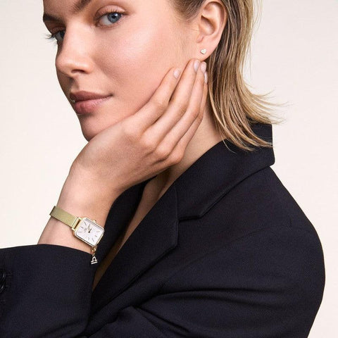 Elegant Daniel Wellington silver crystal heart stud earrings in stainless steel with a delicate 4.2mm claw setting.