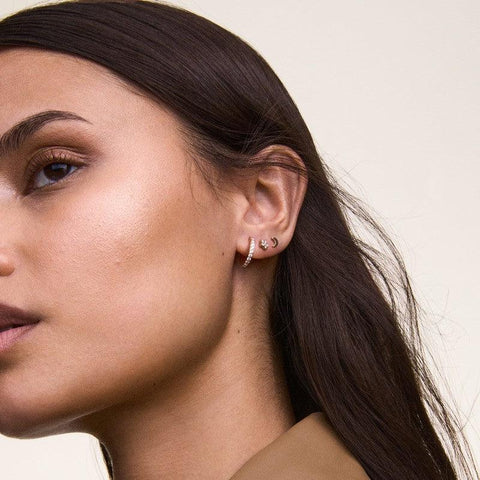 Elegant 4.5mm rose gold star stud earring with sparkling claw-set crystals, crafted from durable PVD-plated stainless steel.