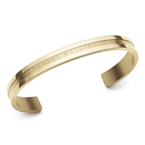 Daniel Wellington Elan Bracelet in gold-plated stainless steel with a sleek 7mm wide cuff design and engraved logo.