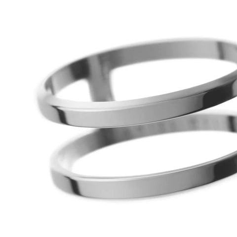 Minimalist Daniel Wellington Elan Dual Ring in polished silver stainless steel with a sleek, modern open-band design.