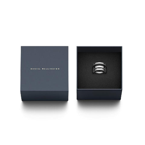 Daniel Wellington Elan Triad silver stainless steel ring featuring a sleek three-band design in a branded gift box.