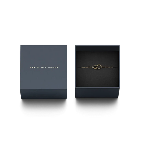 Daniel Wellington Elan Unity gold bracelet featuring two interlocking rings in a premium branded gift box.