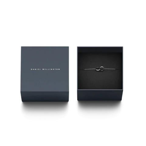 Daniel Wellington Elan Unity silver stainless steel bracelet featuring interlocking rings, presented in a branded gift box.