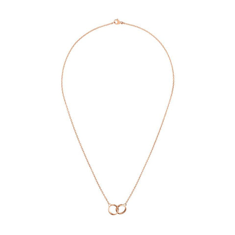 Elegant rose gold plated stainless steel Elan Unity necklace featuring two interlocking rings on a delicate chain.