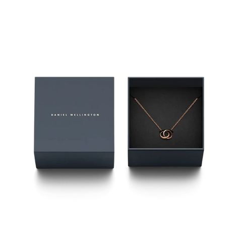 Daniel Wellington Elan Unity necklace in rose gold with interlocking rings, presented in a premium branded gift box.