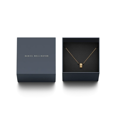 Daniel Wellington Elevation gold stainless steel pendant necklace on a sleek cable chain inside a branded gift box.