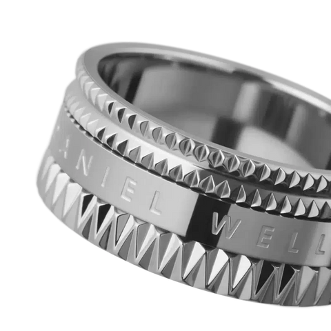 Daniel Wellington Elevation ring in polished silver stainless steel with a geometric, textured design and engraved logo.