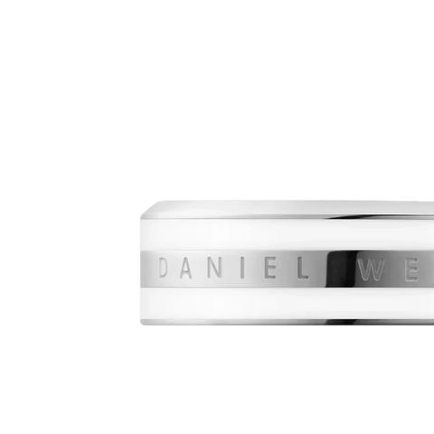 Daniel Wellington Emalie ring in silver stainless steel with white enamel inlay and engraved logo detail.