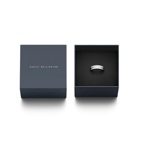 Daniel Wellington Emalie ring in silver stainless steel with white enamel, presented in an elegant branded gift box.