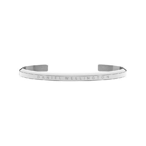 Large Daniel Wellington silver stainless steel cuff bangle featuring a sleek, minimalist design with engraved branding.