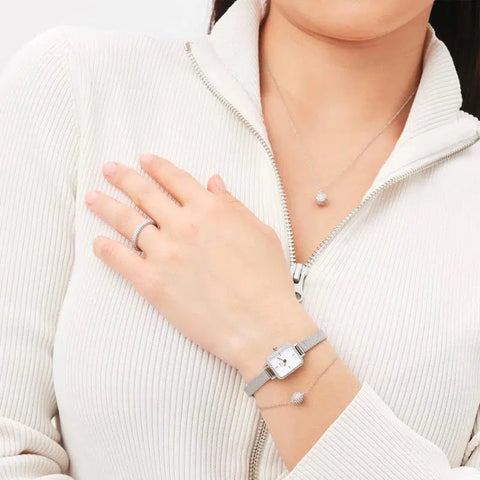 Daniel Wellington silver rhodium-plated ring featuring sparkling claw-set crystals on a slim, stackable band.