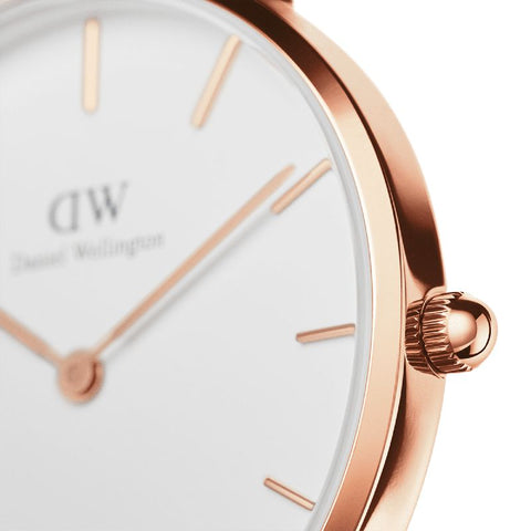 Daniel Wellington Petite Melrose 24mm watch featuring an elegant rose gold case and a clean eggshell white dial.