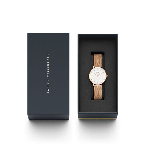 Daniel Wellington Petite Melrose 24mm watch with eggshell white dial and elegant rose gold mesh strap in gift box.