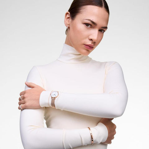 The Watch Boutique Daniel Wellington Petite Rose Gold Roman Numerals Date Watch