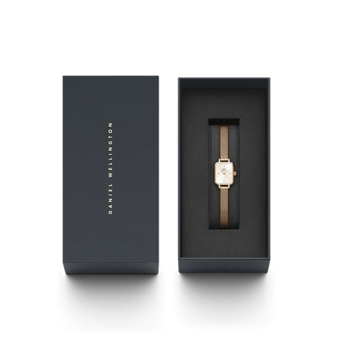 Daniel Wellington Quadro Mini rose gold watch with champagne sunray dial and mesh strap in a premium gift box.
