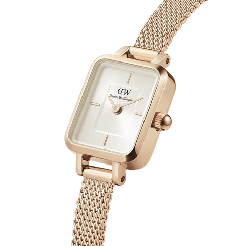 Daniel Wellington Quadro Mini rose gold watch with a champagne sunray dial and elegant pressed mesh bracelet.
