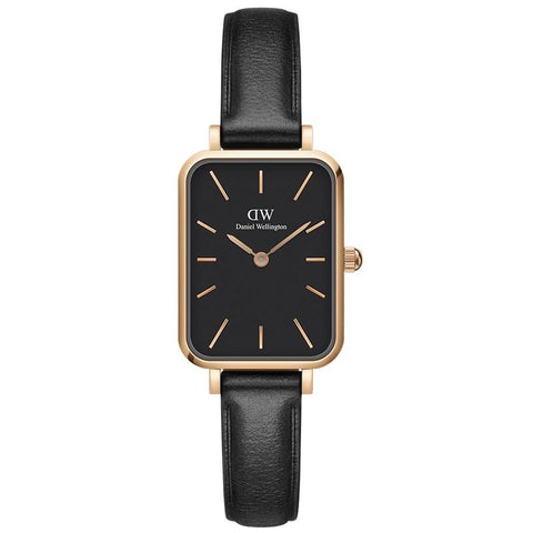 Daniel Wellington Quadro watch with a square black dial, rose gold case, and elegant black leather strap.