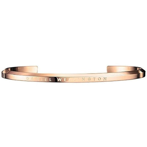 Elegant small Daniel Wellington cuff bangle in polished rose gold-plated stainless steel with engraved branding.
