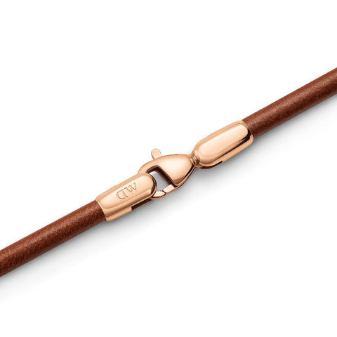 Daniel Wellington St Mawes brown leather bracelet featuring a polished rose gold lobster clasp and stainless steel accents.