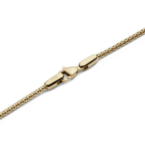 Daniel Wellington Tide gold stainless steel mesh necklace featuring a secure lobster clasp with engraved DW logo.