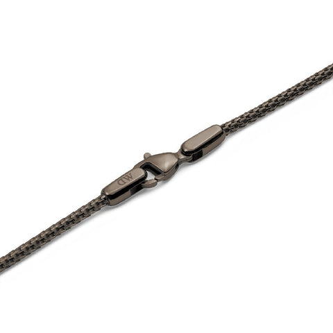 Daniel Wellington Tide necklace in graphite stainless steel mesh with a secure lobster clasp and engraved DW logo.