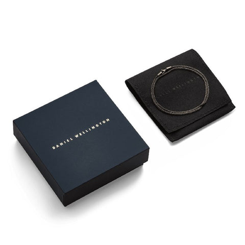 Daniel Wellington Tide graphite stainless steel mesh necklace with lobster clasp, presented in a branded gift box and pouch.