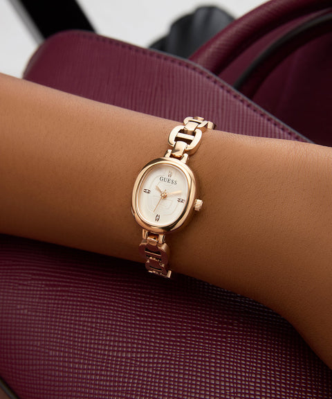 The Watch Boutique GUESSRose Gold Analog Watch with Oval White Dial