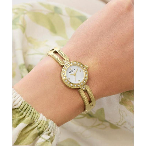 The Watch Boutique Guess Gold Tone Ladies Analog Watch with Crystal-Studded Bracelet