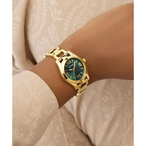 The Watch Boutique Guess Gold Tone Ladies Analog Watch with Green Dial