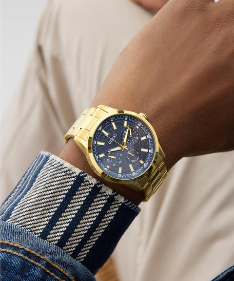 The Watch Boutique Guess Gold Tone Multi-Function Watch with Blue Dial