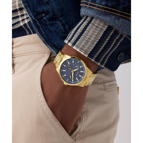 The Watch Boutique Guess Gold Tone Multi-Function Watch with Blue Dial