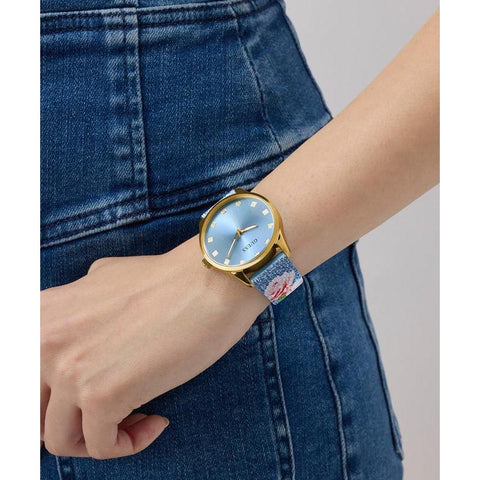 The Watch Boutique Guess Ladies Blue Gold Tone Analog Watch with Denim Strap