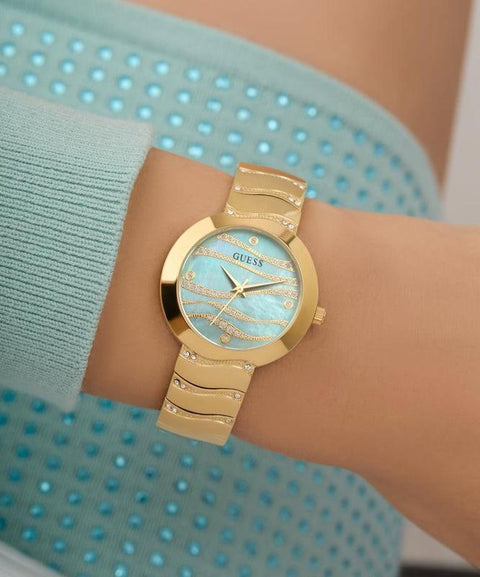 The Watch Boutique Guess Ladies Gold Tone Analog Watch